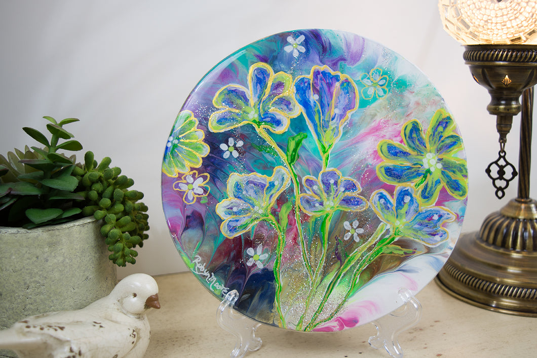 flowers layered on top of rainbow watercolor background round wood