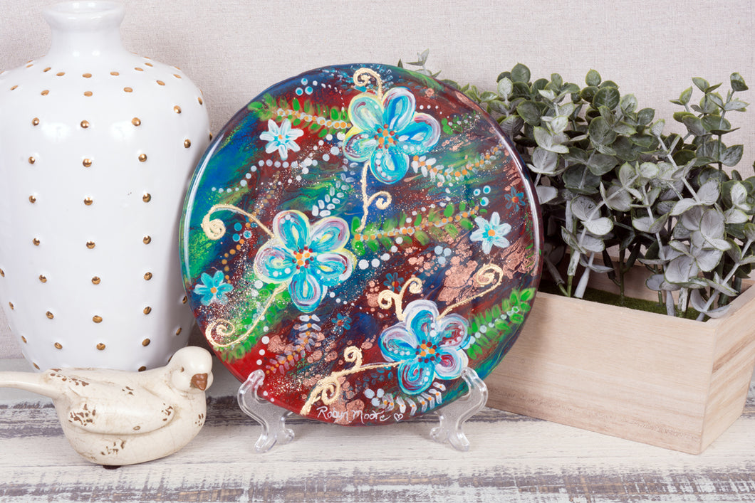 vibrant abstract background with daisies round resin painting