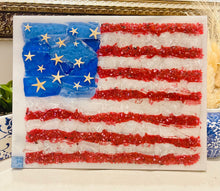Liberty original American flag artwork created with recycled glass and epoxy resin featuring textured red stripes, translucent white layers, and vibrant blue stars on an 11 x 14 wood panel.