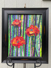 framed red and orange flowers with green and purple striped background