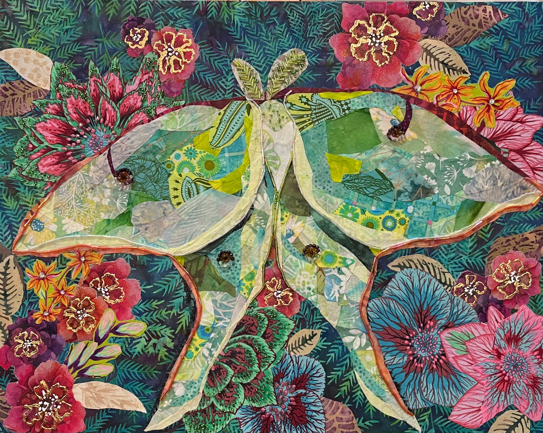 Luna moth textile art with green wings surrounded by colorful floral collage and beaded embellishments