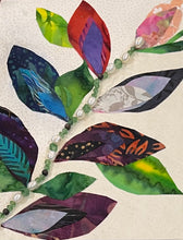 Botanical fabric mixed media wall art with layered leaves and beaded branch detail in a nature-inspired composition