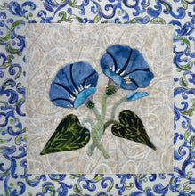 Artistic depiction of blue flowers with green leaves on a textured beige background, surrounded by decorative blue floral patterns.