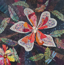 Dark floral wall art in fabric mixed media with layered petals, beadwork, and dimensional botanical detail on textured background