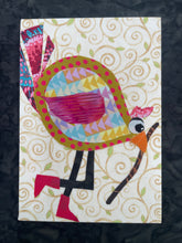 Quirky fabric collage bird with colorful patterned body holding a walking stick with red boots, set against a soft swirling background