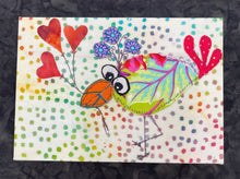 Quirky fabric collage bird holding heart-shaped balloons on a colorful dotted background with playful flower details