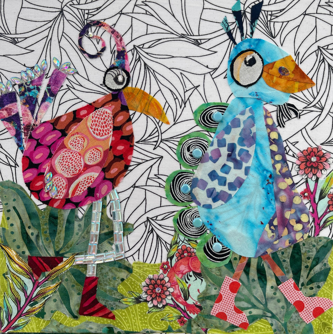 Whimsical fabric collage artwork of two birds moving together with colorful patterns and embellishments on an 8 x 8 panel