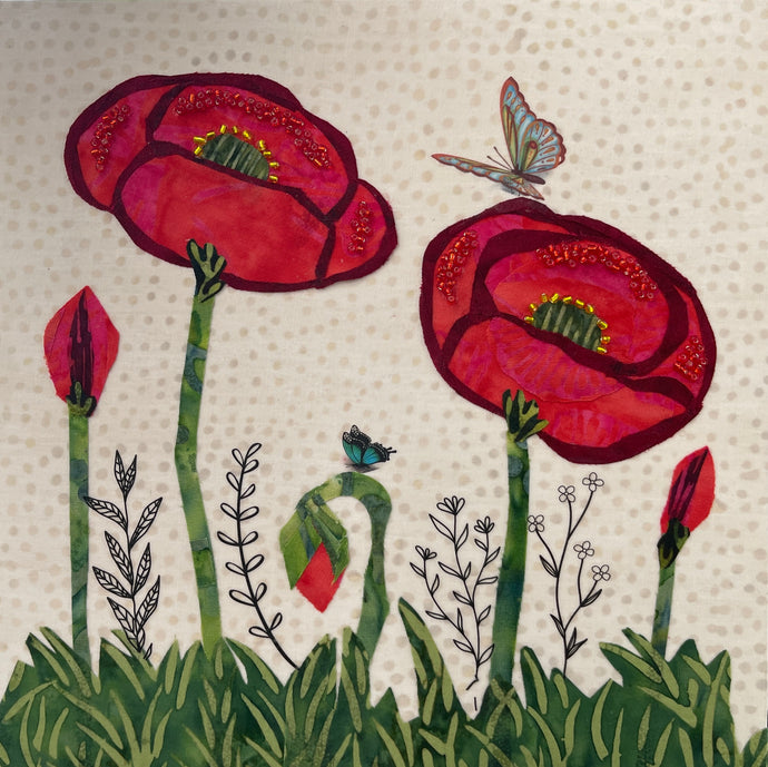 8 x 8 fabric collage artwork with red flowers, bead accents, green stems, and butterfly detail on neutral patterned background