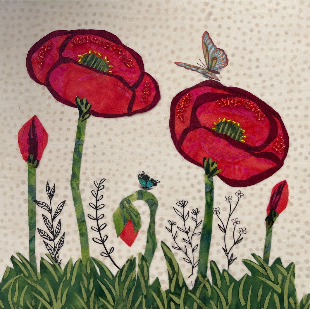 8 x 8 fabric collage artwork with red flowers, bead accents, green stems, and butterfly detail on neutral patterned background