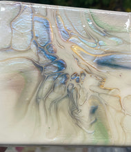 Tidal Veil resin artwork with soft iridescent pearl, gold, blue, and blush pigments creating flowing abstract movement and luminous depth.