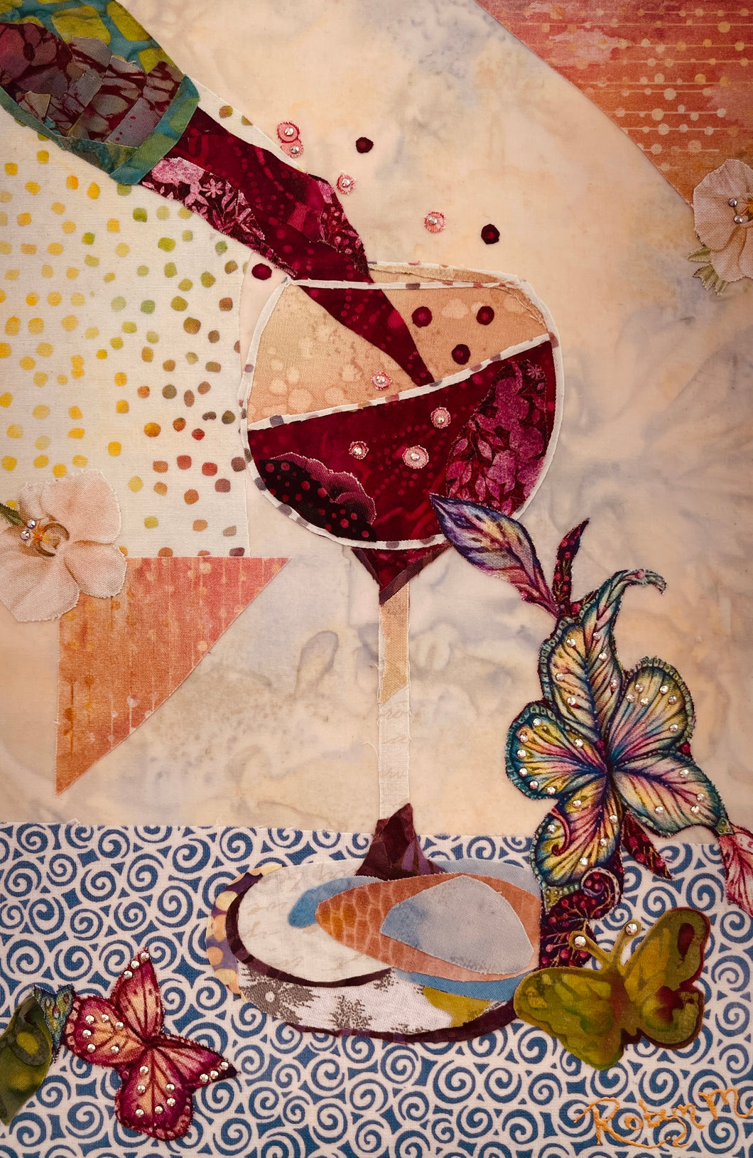 Original red wine fabric artwork 8x12 inches, dramatic wine pour from bottle into patchwork crimson burgundy magenta fabric wine glass Swarovski crystal wine drops teal gold crimson fabric butterflies fabric flowers blue swirl tablecloth patchwork background, birch panel, Whimsical Companions Collection, Robyn Moore Arts