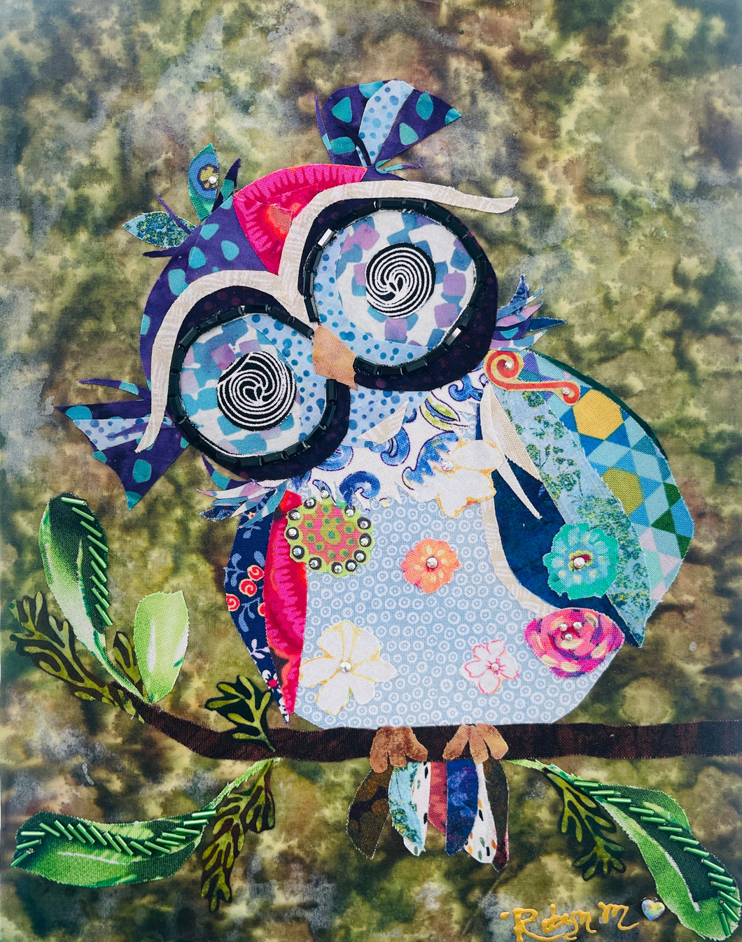 Original whimsical owl fabric artwork 8x10 inches, patchwork owl in blue lavender teal magenta coral fabric with Czech glass bead eye rings spiral center eyes Swarovski crystal flower details purple fabric crown Czech glass bead leaf branch, deep olive brown batik background, birch panel, Whimsical Companions Collection, Robyn Moore Arts
