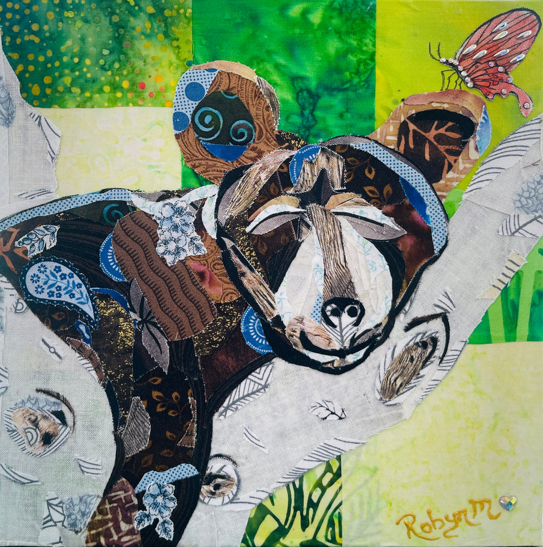Original bear cub fabric artwork 8x8 inches, patchwork brown and tan bear cub resting on a branch with Swarovski crystal butterfly, green and yellow batik background, birch panel, Whimsical Companions Collection, Robyn Moore Arts