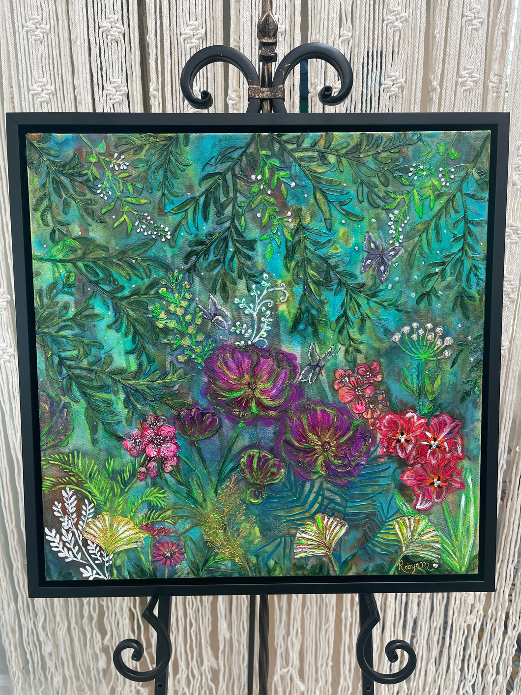 Original botanical acrylic artwork 20x20 inches, jewel-toned garden of plum and crimson ruffled blooms with trailing fern foliage, gold leaf accents, and scattered Swarovski crystal detail, framed, Where Color Takes Root Collection, Robyn Moore Arts