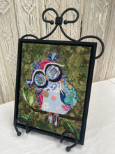 Original whimsical owl fabric artwork 8x10 inches, patchwork owl in blue lavender teal magenta coral fabric with Czech glass bead eye rings spiral center eyes Swarovski crystal flower details purple fabric crown Czech glass bead leaf branch, deep olive brown batik background, birch panel, Whimsical Companions Collection, Robyn Moore Arts