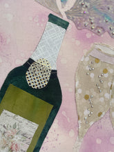 Close detail of Swarovski crystal champagne spray and bubble embellishment on original fabric artwork Rosé All Day by Robyn Moore Arts, showing iridescent lavender grey fabric spray forms with scattered crystal droplets catching light above gold polka dot fabric champagne flute