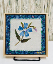 Soft blue textile floral artwork with Swarovski crystal embellishment, part of the Inherited Blooms collection. Original mixed media fabric collage on birch panel.