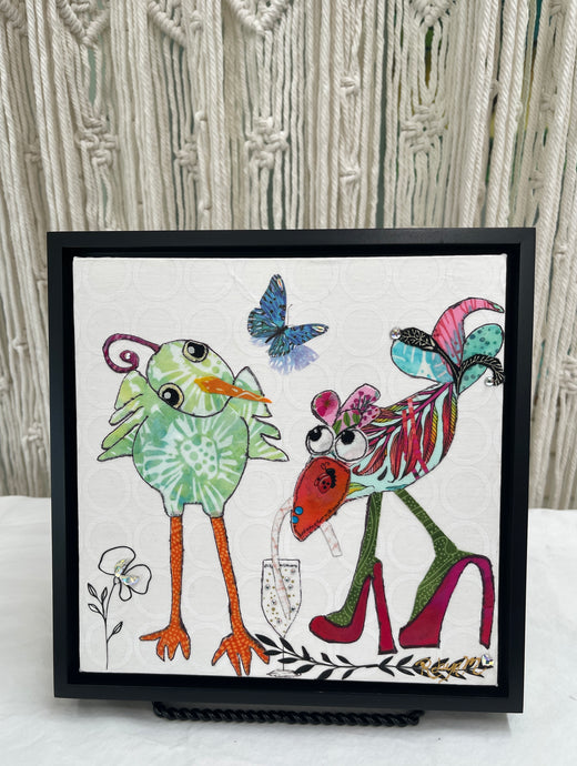 Whimsical textile bird art showing two playful birds with champagne, bright colors, and quirky details in a fun composition