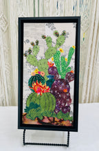 Original flowering cactus fabric artwork 6x12 inches, tall columnar green cacti dramatic dark spotted cactus with vivid pink orange blooms purple prickly pear Swarovski crystals ink pen spine detail, vintage toile botanical text background warm brown ground, birch panel, Floral Botanical Collection, Robyn Moore Arts