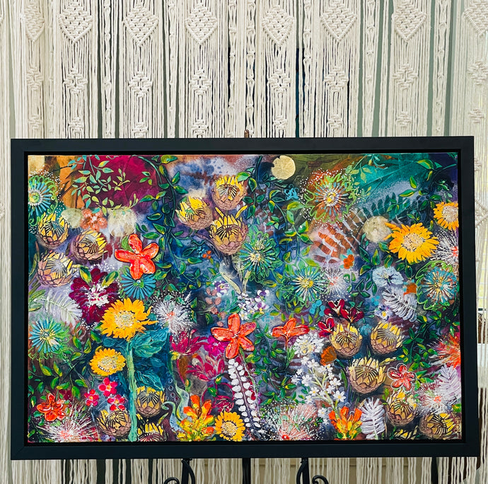 Original large format botanical acrylic painting 36x24 inches, densely layered garden composition with sunflowers protea artichoke blooms red lilies white wildflowers and lush green foliage in yellow orange red magenta and deep blue green, textured dimensional surface, gallery wrapped canvas, part of the Floral and Botanical and Where Color Takes Root Collections by Robyn Moore Arts
