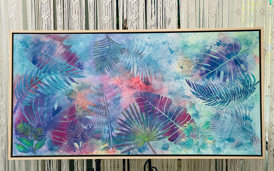 Original large format botanical acrylic painting 24x48 inches, ethereal wash of periwinkle blue lavender coral and peach with tropical leaf silhouettes in teal violet and magenta created through stenciling and nature printing over real leaves, beach sand and texture paste surface detail, gallery wrapped canvas, part of the Where Color Takes Root Collection by Robyn Moore Arts