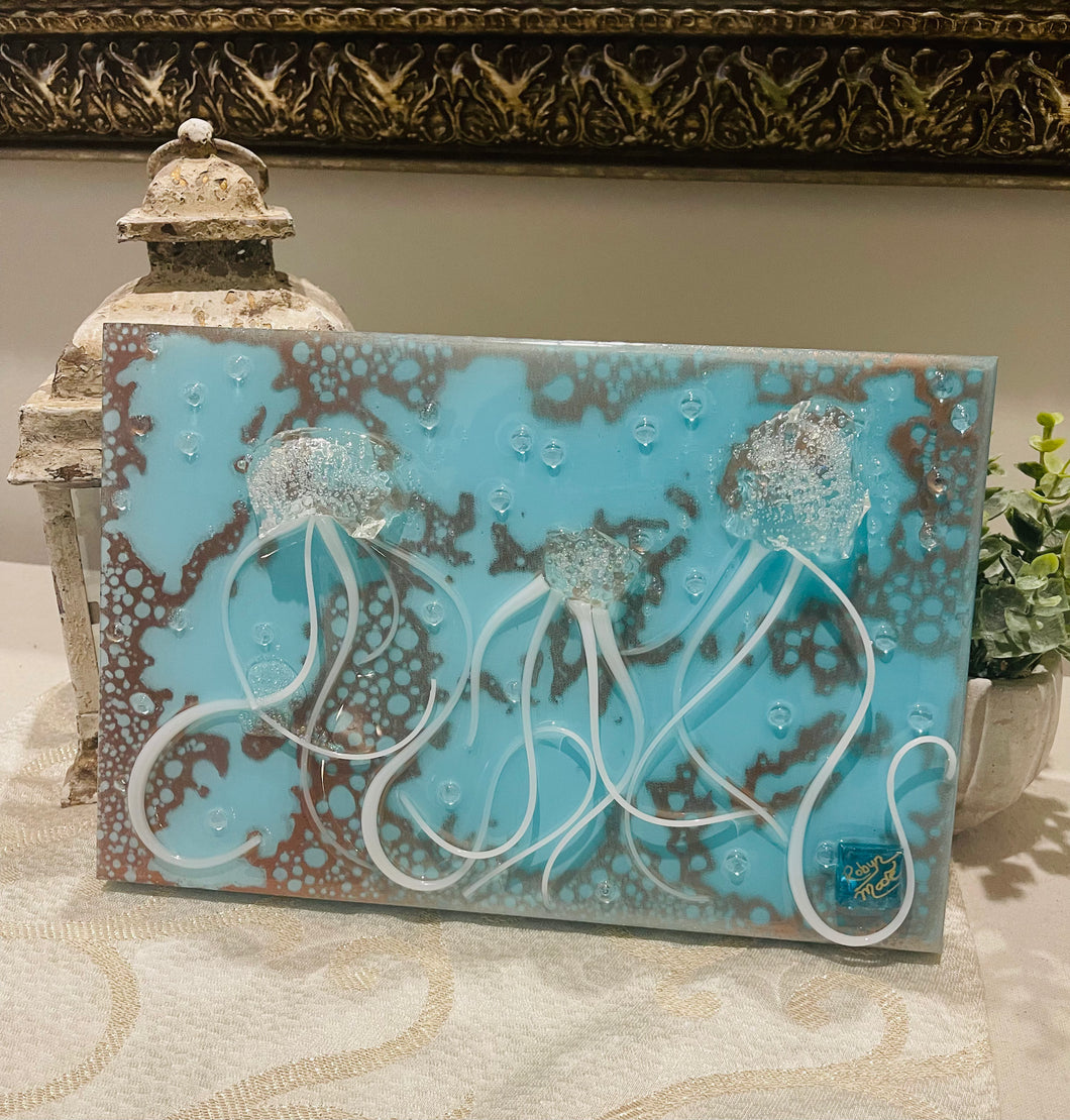 White jellyfish glass and epoxy resin wall art with flowing organic shapes and dimensional texture on panel