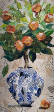 Original mixed media botanical artwork 12x24 inches, lush bouquet of peach and orange fabric blooms in a patchwork blue and white chinoiserie fabric vase, layered green foliage, vintage paper ephemera background with handwritten text and sheet music, Czech glass bead detail, on birch panel, part of the Floral and Botanical Collection by Robyn Moore Arts
