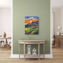 Original fabric landscape artwork Where the Day Rests by Robyn Moore Arts displayed above a reclaimed wood console in a dining room with cool neutral toned accents