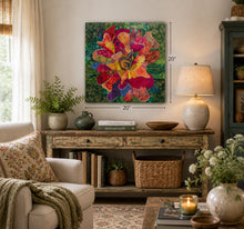 Original fabric botanical artwork Wild Bloom by Robyn Moore Arts displayed above a styled console table with decorative objects in a warm transitional interior