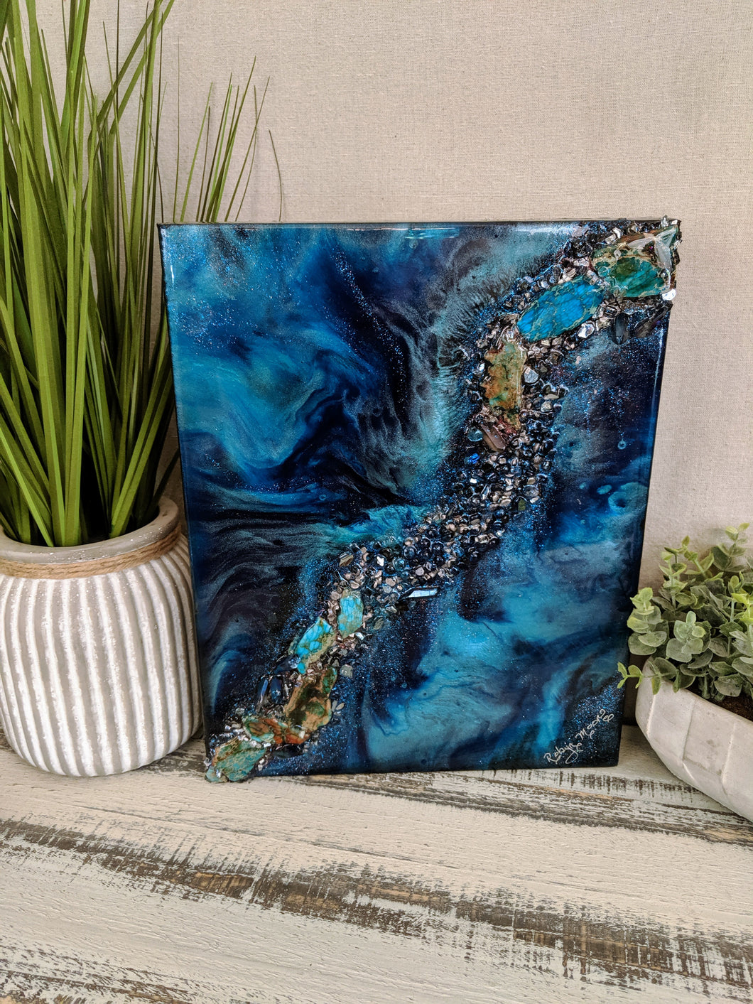 abstract blue teal resin art with turquoise crystals and fire glass