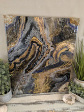 abstract resin art in black brown bronze and white to look like a agate