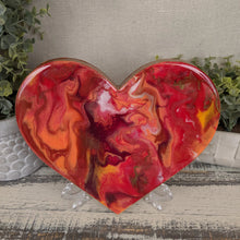 abstract fluid heart with orange, dark red and bright red and gold