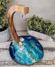 ocean inspired resin and wood banana holder blue and teal with shells