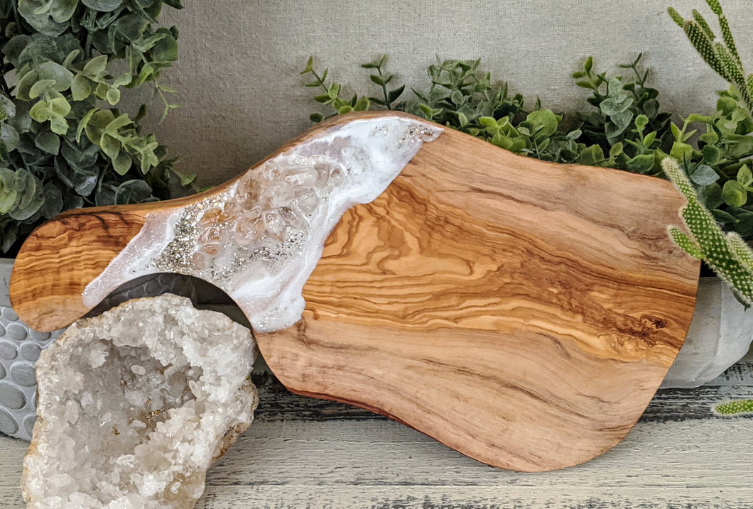 olive wood cheese board with white resin crystals and silver glitter