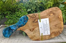 olive wood cheese board with teal green gold resin and fire glass