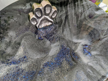 close up chrome dog food canister with grey black and blue glitter resin