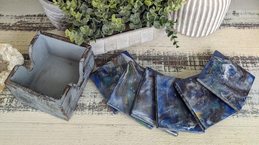 6 wood coasters with blue grey resin and holder