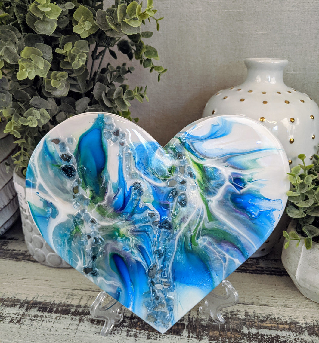 abstract blue green white resin heart with fire glass