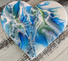 abstract blue green white resin heart with fire glass