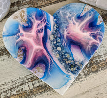 abstract blue pink resin heart with fire glass