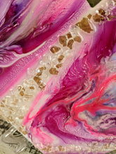 close up abstract resin heart pink lavender fire glass