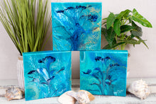 abstract fluid acrylic painting with vibrant blue green colors and flower