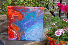 abstract fluid acrylic painting with texture and vibrant rainbow colors