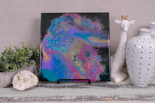abstract fluid acrylic painting with texture and vibrant teal lavender magenta colors