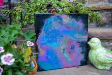 abstract fluid acrylic painting with texture and vibrant teal lavender magenta colors