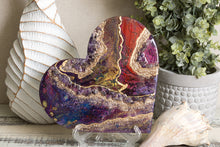 Abstract red purple gold heart with stones