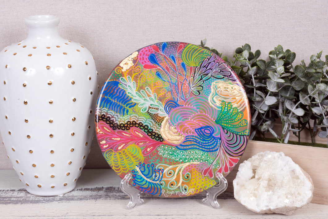 abstract rainbow colors of acrylic paint underwater coral round resin wood