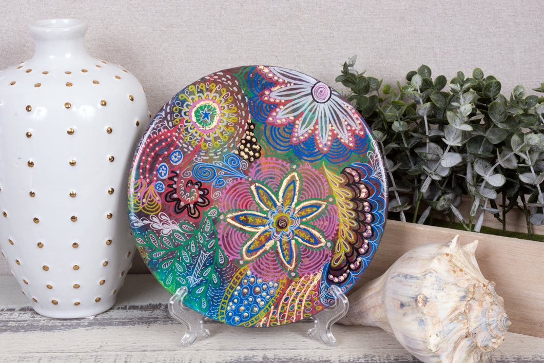 abstract rainbow colors of acrylic paint flower round wood with resin