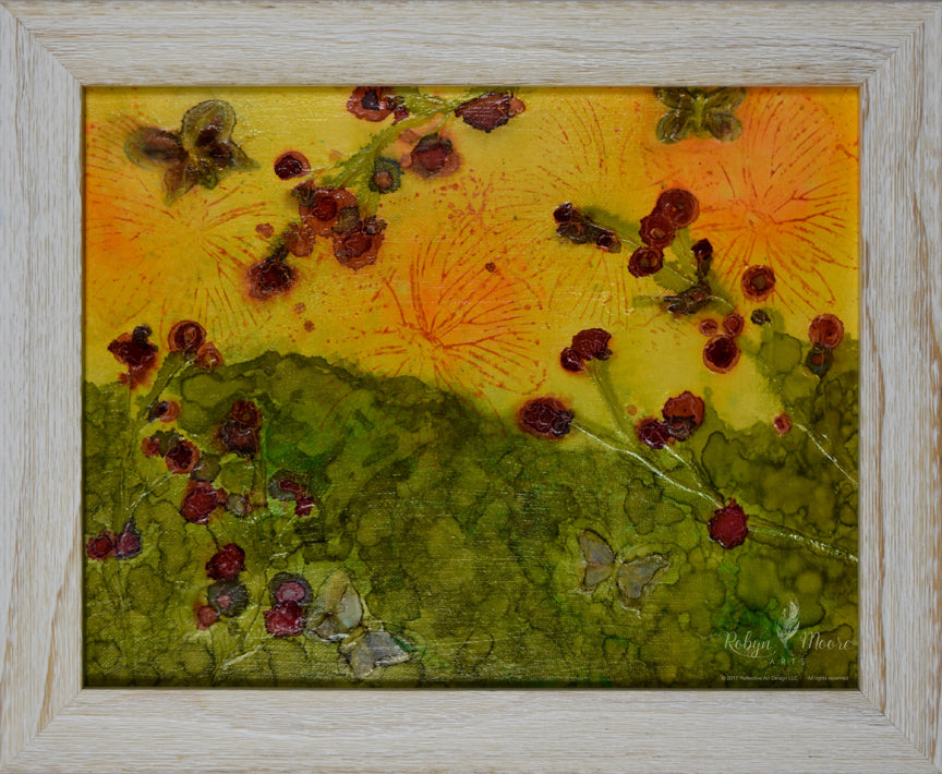 Alcohol ink painting of bright sunny hillside of flowers and butterflies