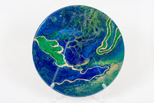 abstract fluid resin trivet with vibrant blue green gold colors